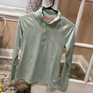 Long sleeve sea green shirt.